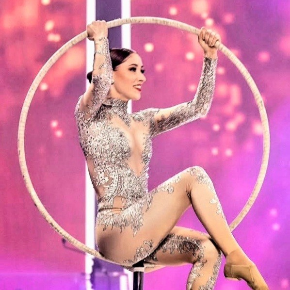 Performer sitting hoop